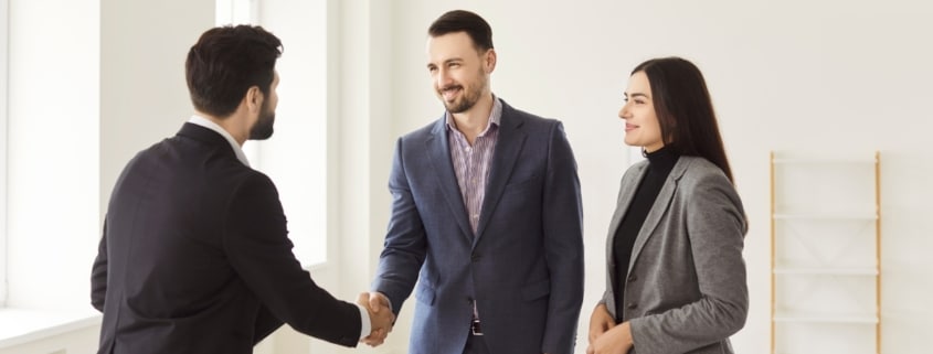 Property manager discussing rental pricing with a landlord in Salt Lake City