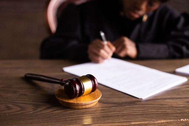 a judge signing documents