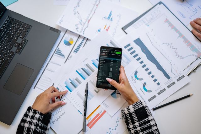 a person reviewing finances a person reviewing finances