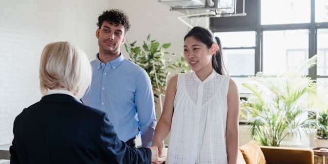 a-property-manager-conducting-a-property-showing-with-two-tenants a-property-manager-conducting-a-property-showing-with-two-tenants