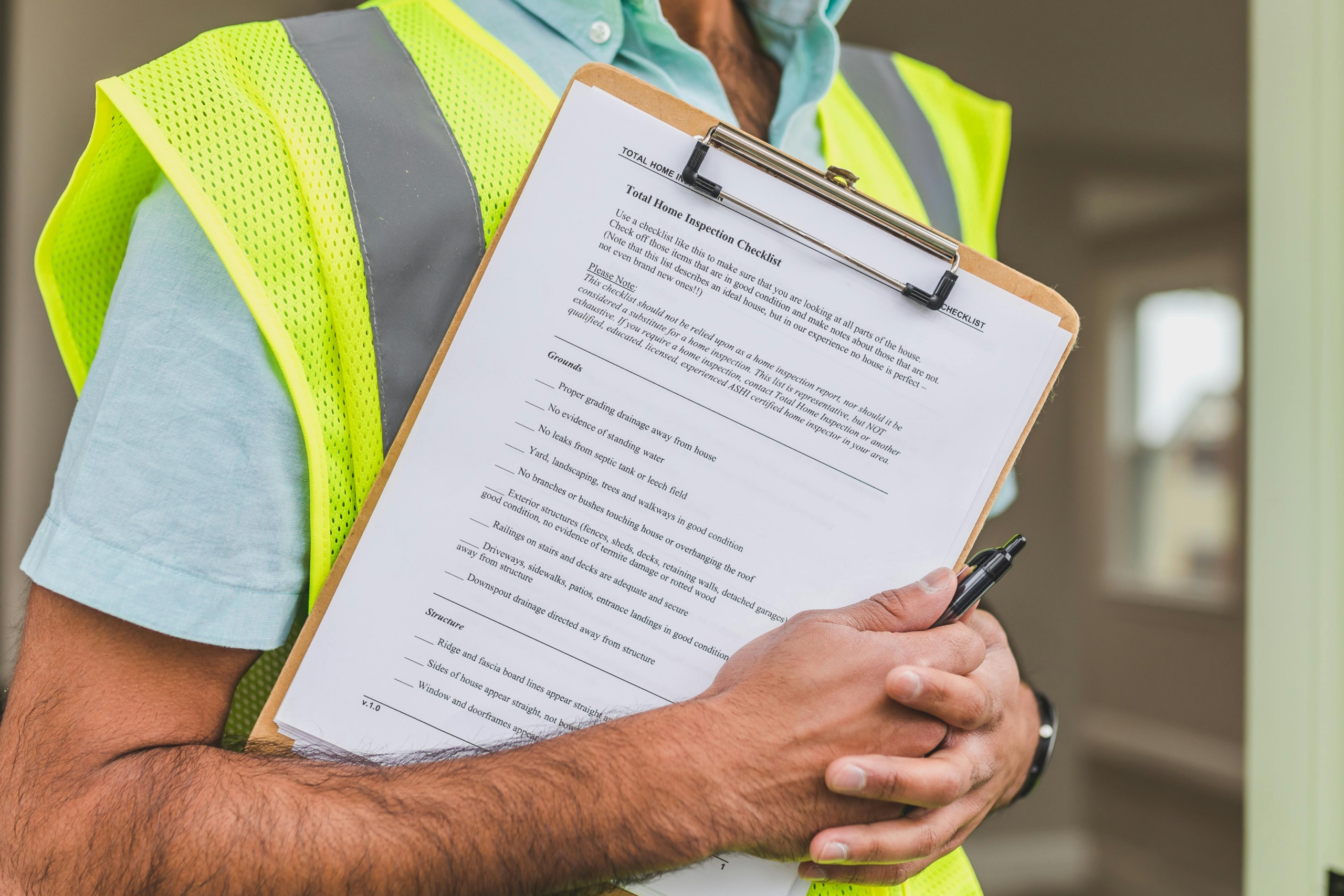 person-holding-clipboard person holding clipboard